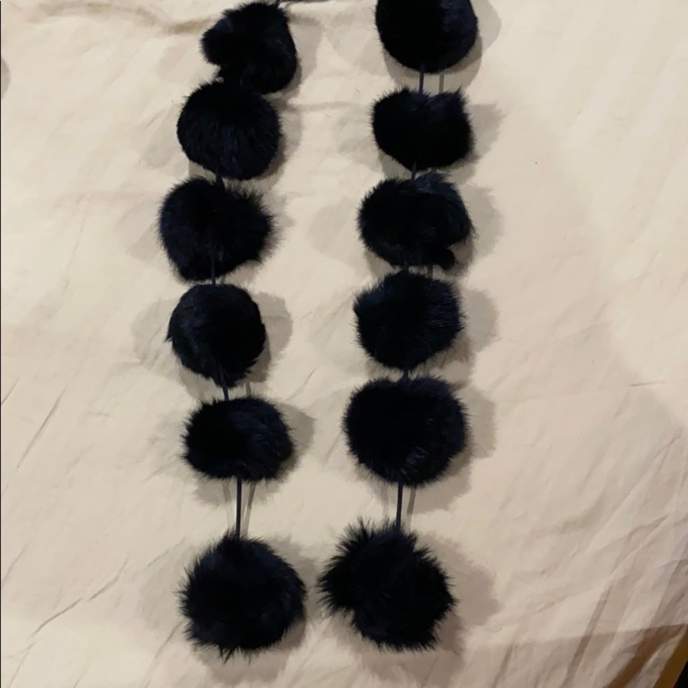 Black boa with soft furry pom-poms